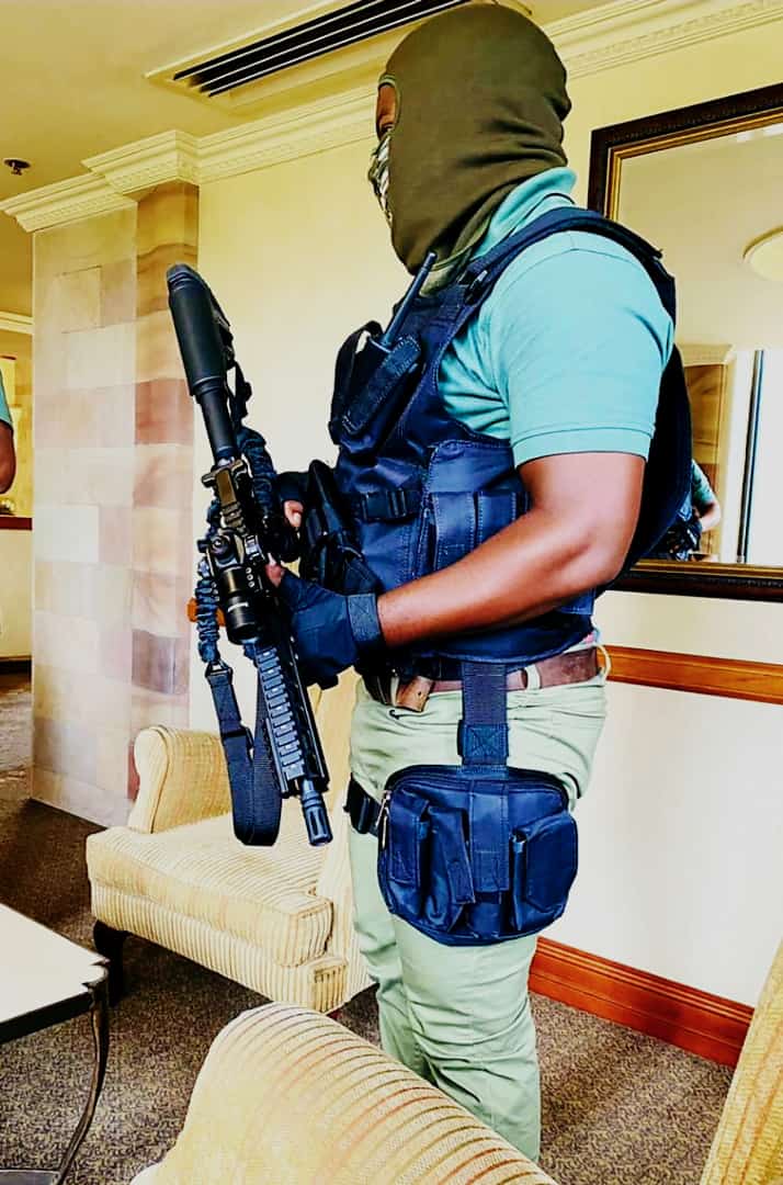 A technician working on a security installation